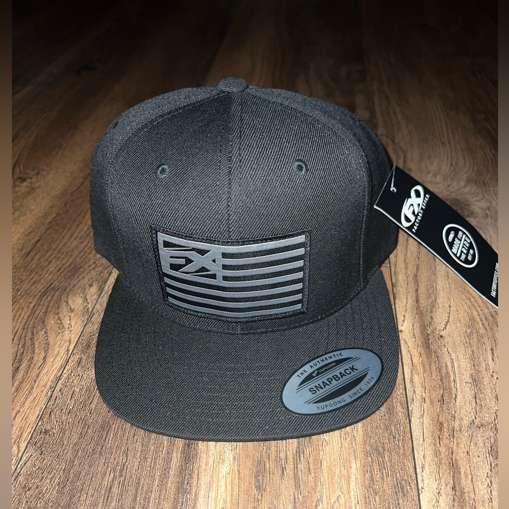 NWT Men’s FX Flag SnapBack Hat.
